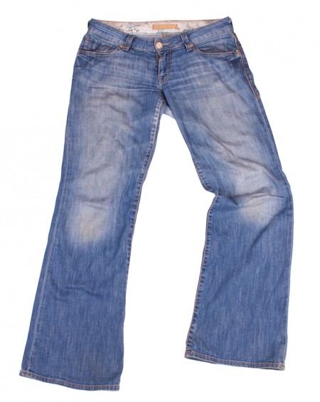 Flared blue jeans isolated on white - Denim Hacker